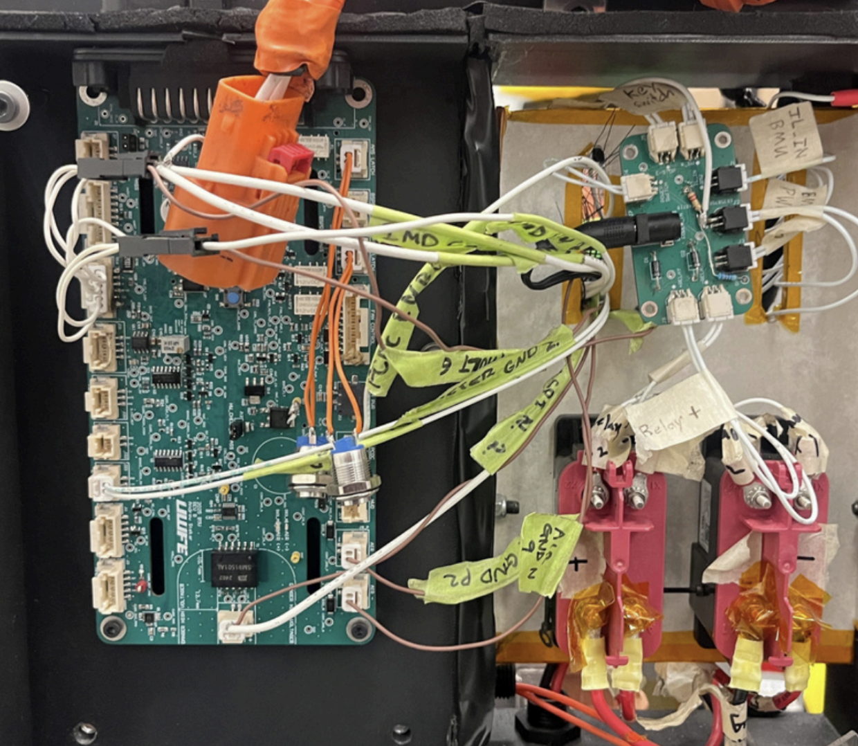 Charge cart wiring harness inside enclosure